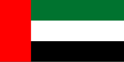 Flag of the United Arab Emirates with vertical red stripe on the left and horizontal green, white, and black stripes on the right.